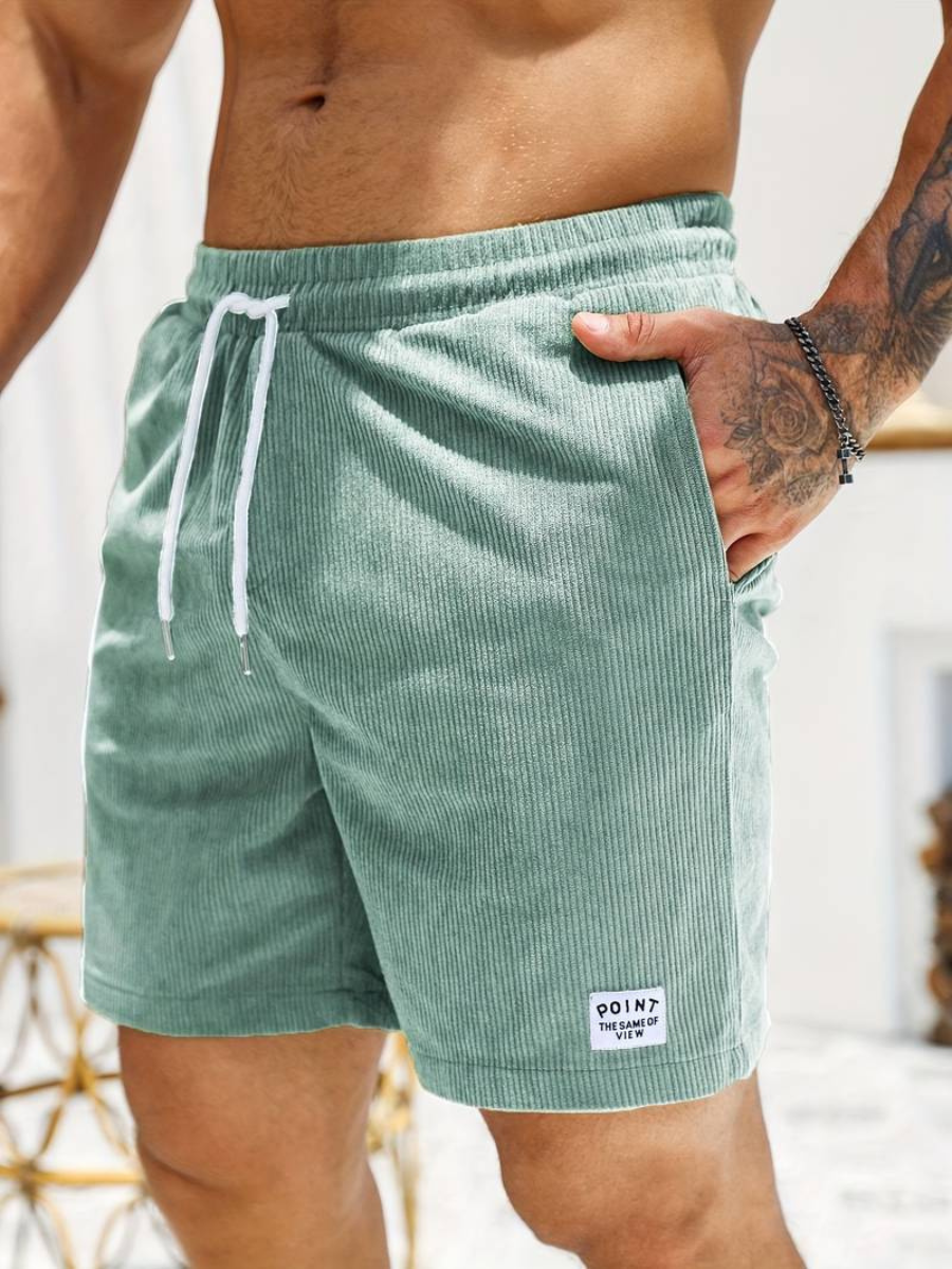 Hippe actieve strandshort voor heren in lichtgrijs met elastische tailleband en modern geribbeld design.