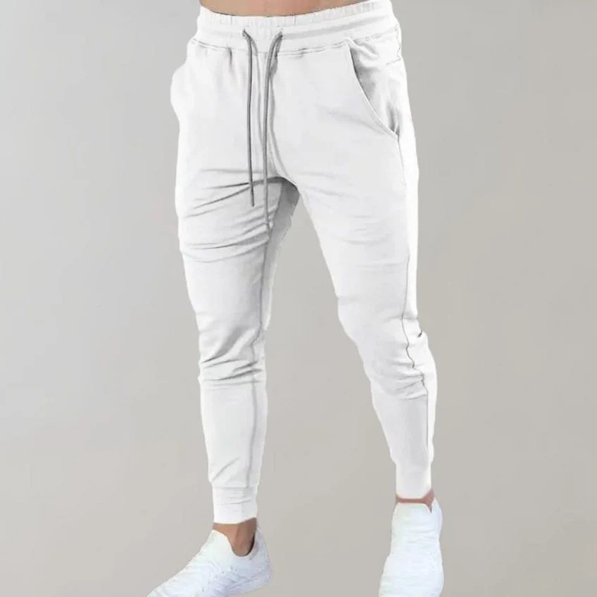 Modieuze en comfortabele heren joggers met nauwsluitende pasvorm en elastische tailleband.







