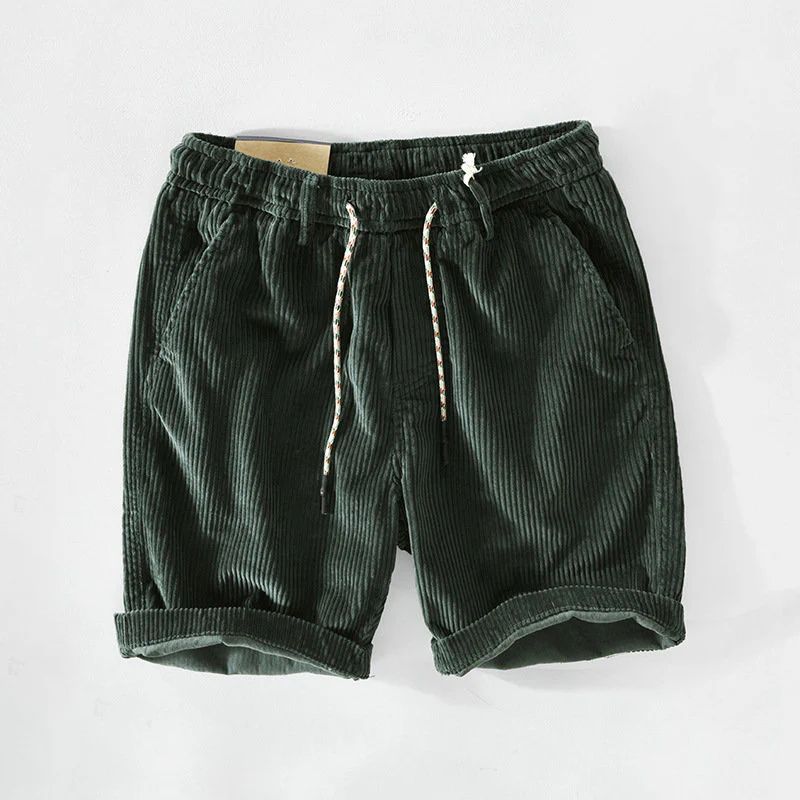 Geribbelde katoenen shorts voor de zomer in donkergroen met elastische taille en trendy design.








