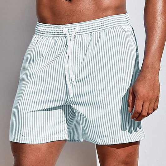 Gestreepte boardshorts voor heren met elastische tailleband en trekkoord.






