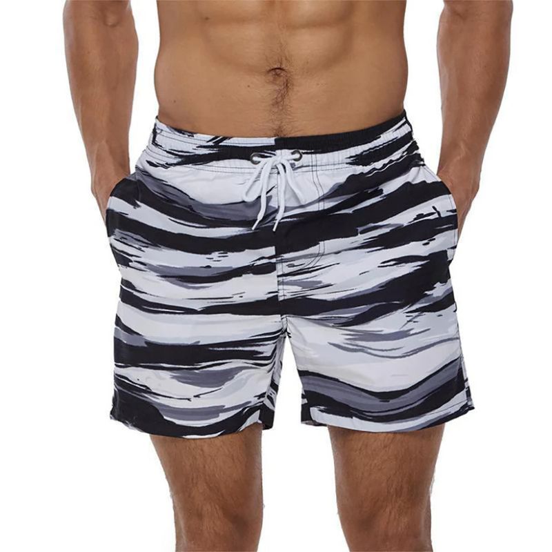 Trendy en comfortabele zomer boardshorts voor heren met een opvallend tie-dye patroon en een elastische taille met trekkoord.